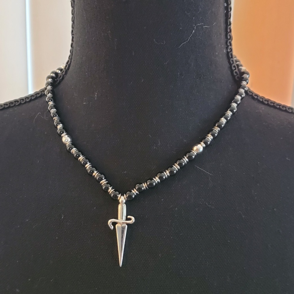 NWOT Slay the Style Game with this Cesare Paciotti Dagger Necklace!